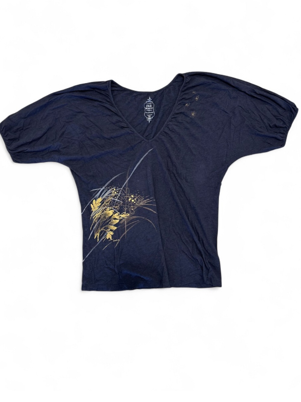 Navy blue flowy top with gold floral graphic.
